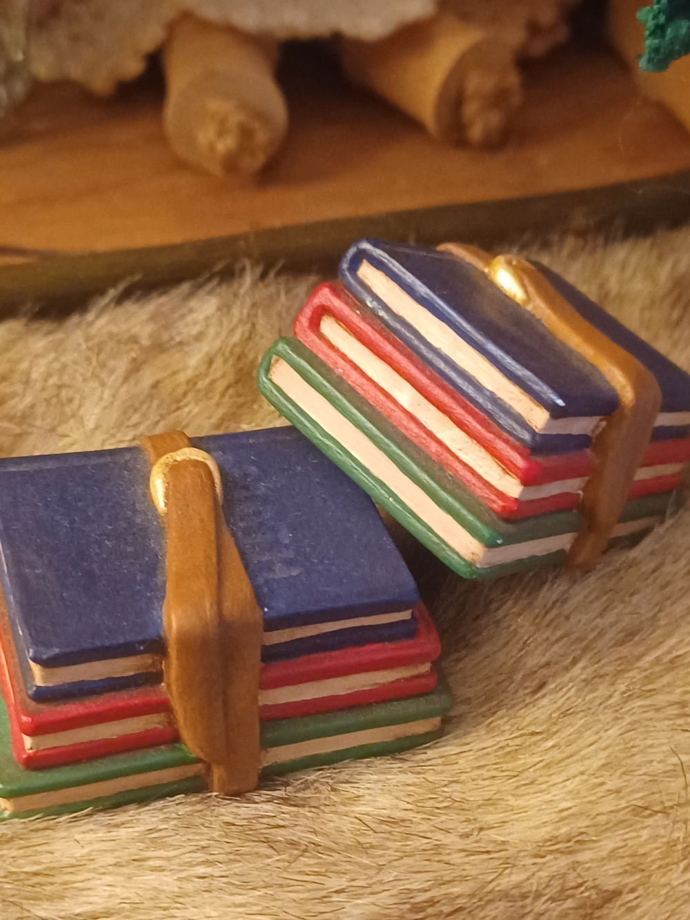 Stacked Colorful Toy Books - Blue, Red, Green.